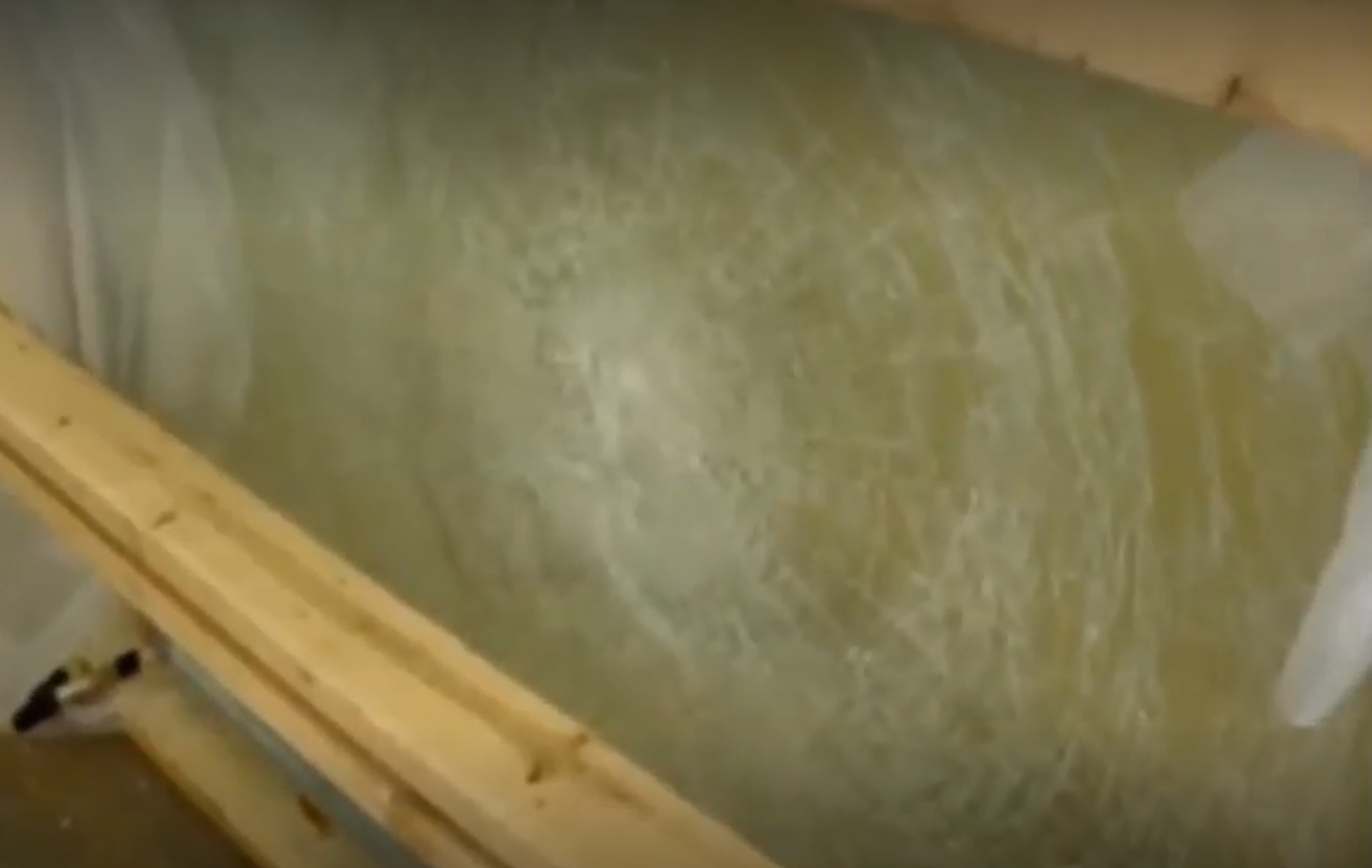 The laminated glass flexes inward during the cycle pressure testing