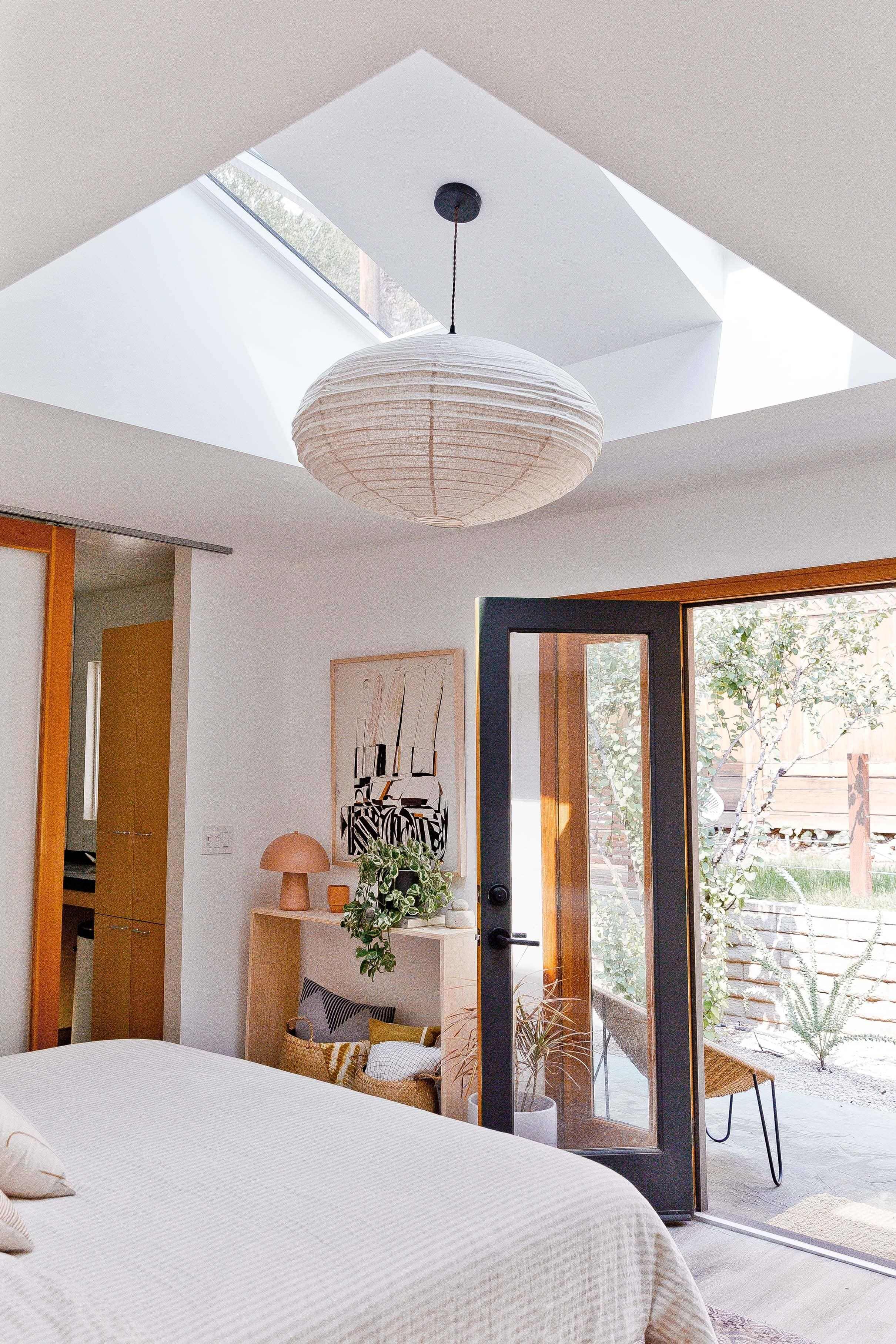 primary-bedroom-white-wood-door-frames-skylightsJPG