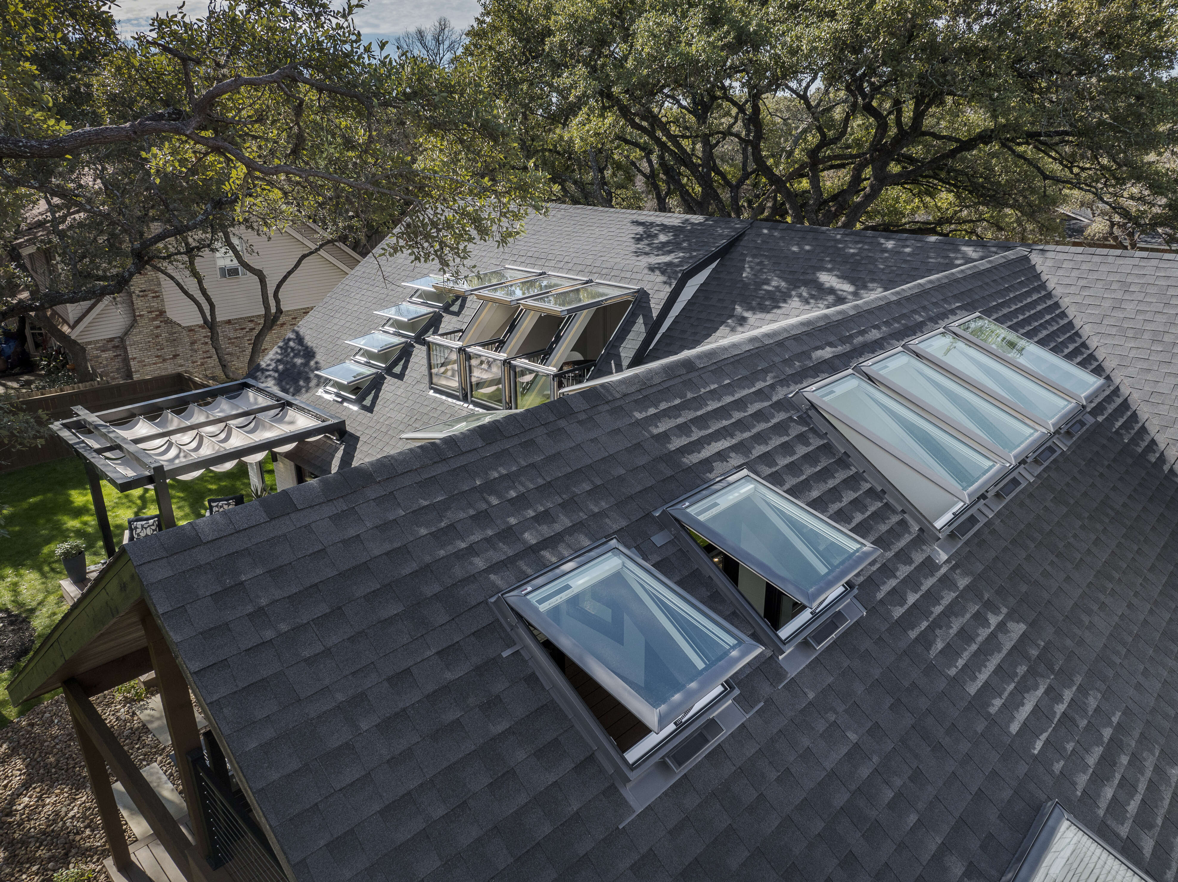 Finished roofing project after multiple skylights installed