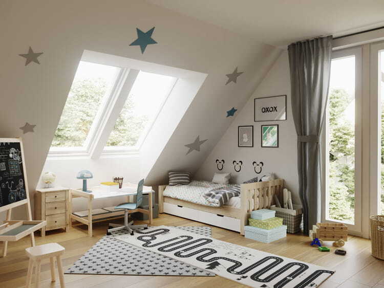 A child's bedroom with two skylights right next to the bed.