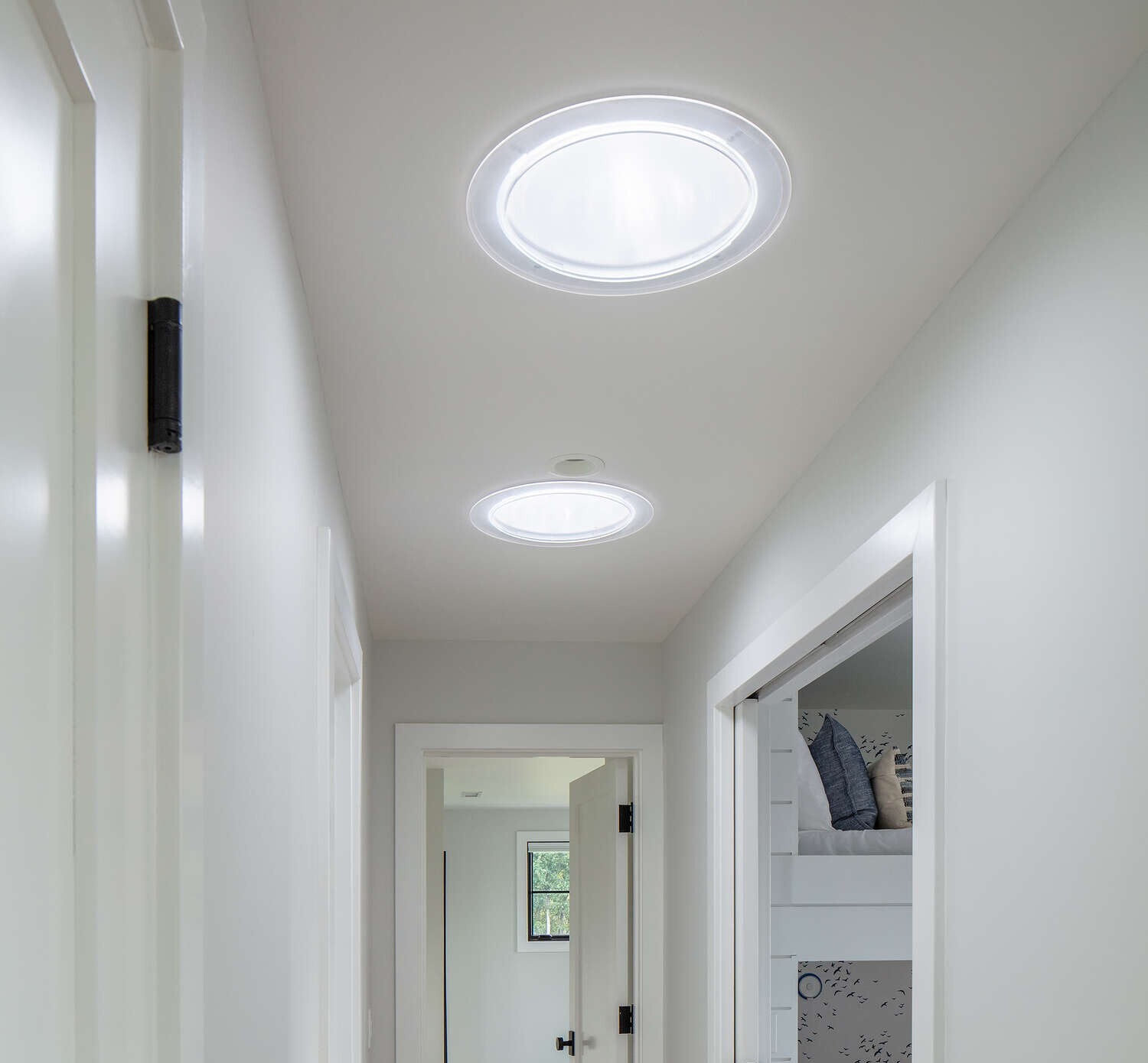 Sun Tunnel Skylights in a hallway as a simple eco-friendly home remodeling project