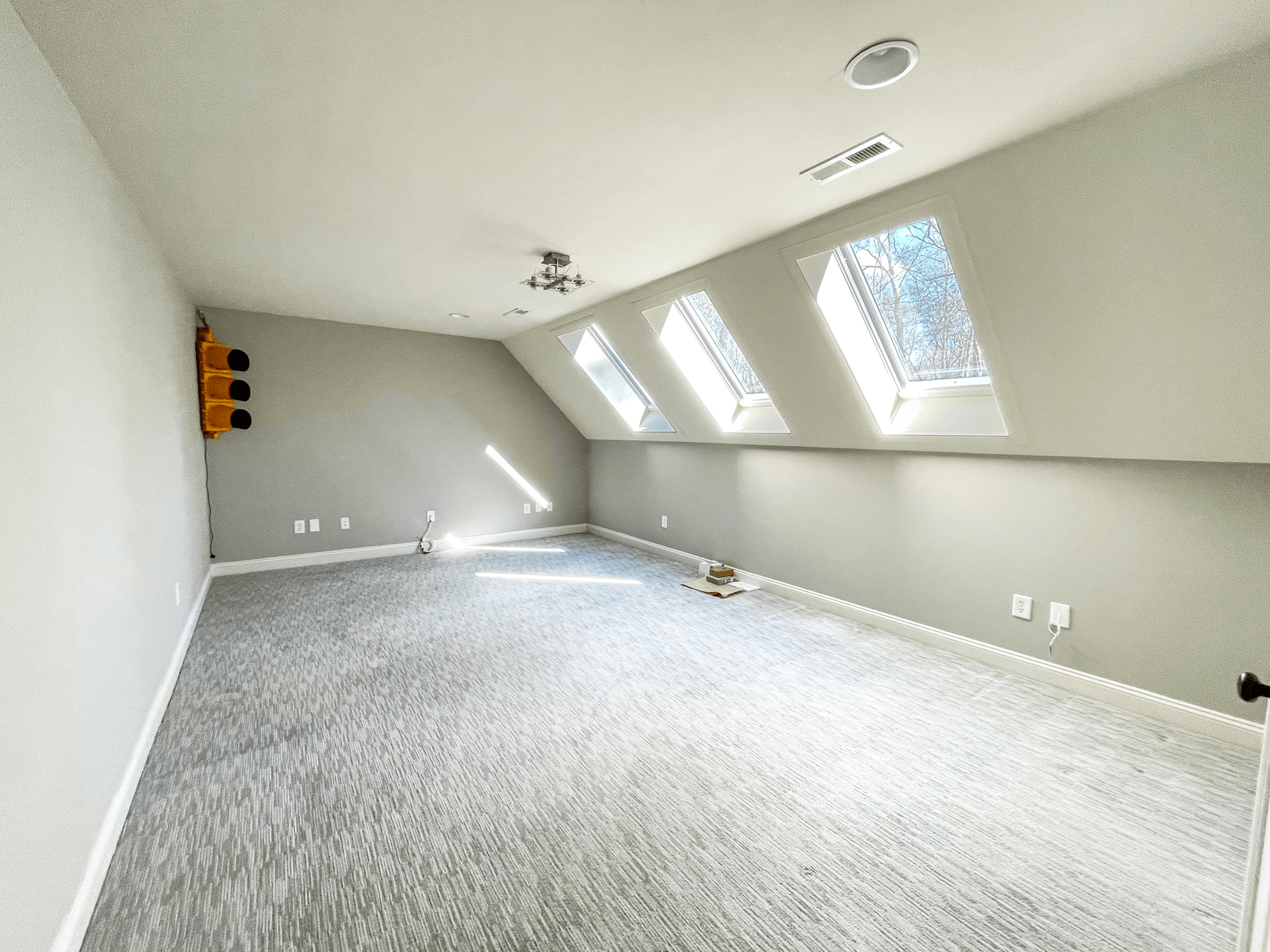 Three skylights in a loft conversion showcasing plenty of natural light
